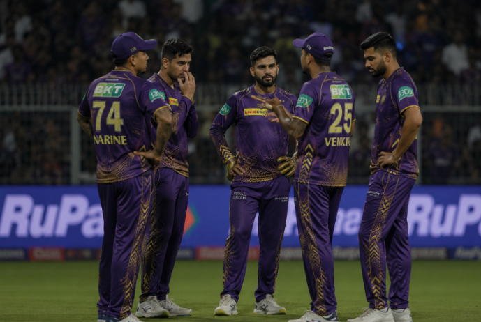 KKR bowlers react during a difficult IPL chase as playoff pressure increases.