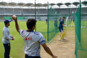 Bangladesh and Australia players prepare ahead of the first ODI in Dhaka.