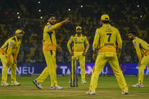 CSK spinners bowl under pressure during a dew-affected IPL 2026 night match.