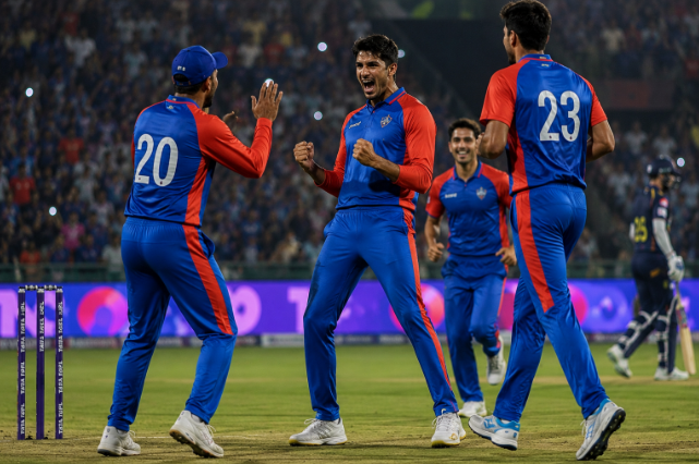 Delhi Capitals bowlers celebrate during a crucial IPL 2026 playoff race match.