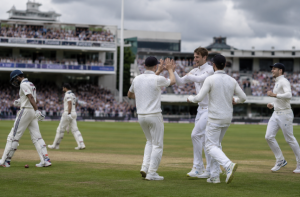 Fast bowlers celebrate during a wicket-filled opening day between England and New Zealand at Lord's.