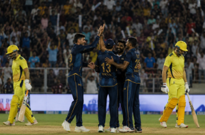 Gujarat Titans players celebrate during a dominant IPL win over Chennai as playoff betting markets react.