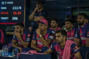 An IPL batting side watches scoreboard pressure rise during a tense middle-overs chase