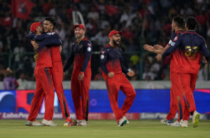 RCB players celebrate wickets during IPL 2026 Qualifier 1 against Gujarat Titans as betting markets react to the playoff result.