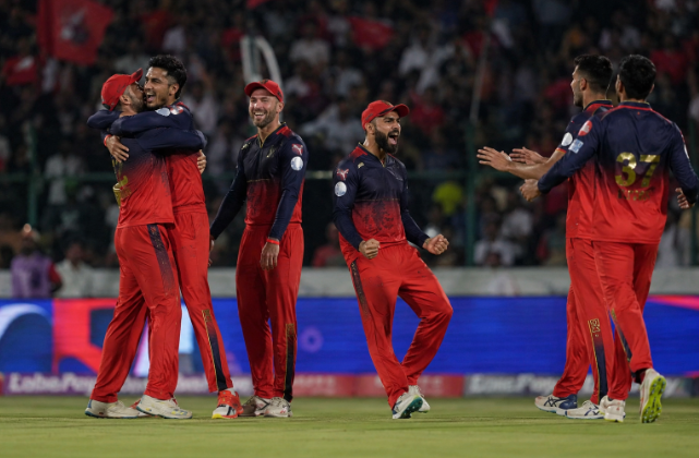 RCB players celebrate wickets during IPL 2026 Qualifier 1 against Gujarat Titans as betting markets react to the playoff result.