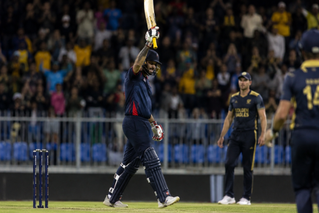Generic middle-order batter celebrates after changing the momentum during an MLC match.