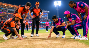 IPL cricketers inspect conditions before the SRH vs RR Eliminator as betting markets react to toss and dew forecasts.