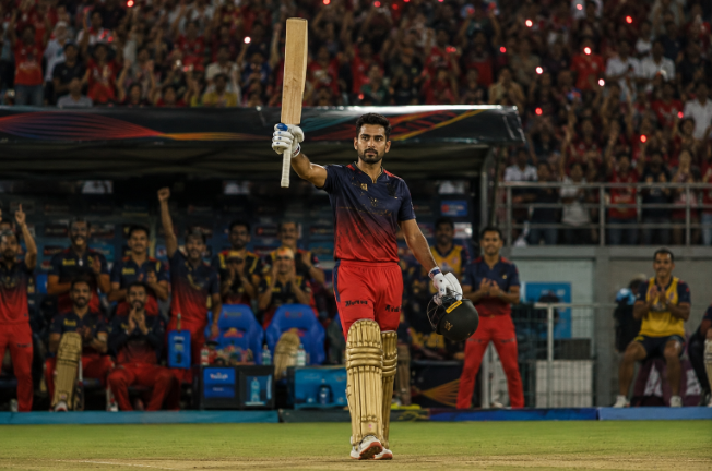 Generic IPL batter celebrates a crucial innings as Orange Cap betting markets tighten late in the season.